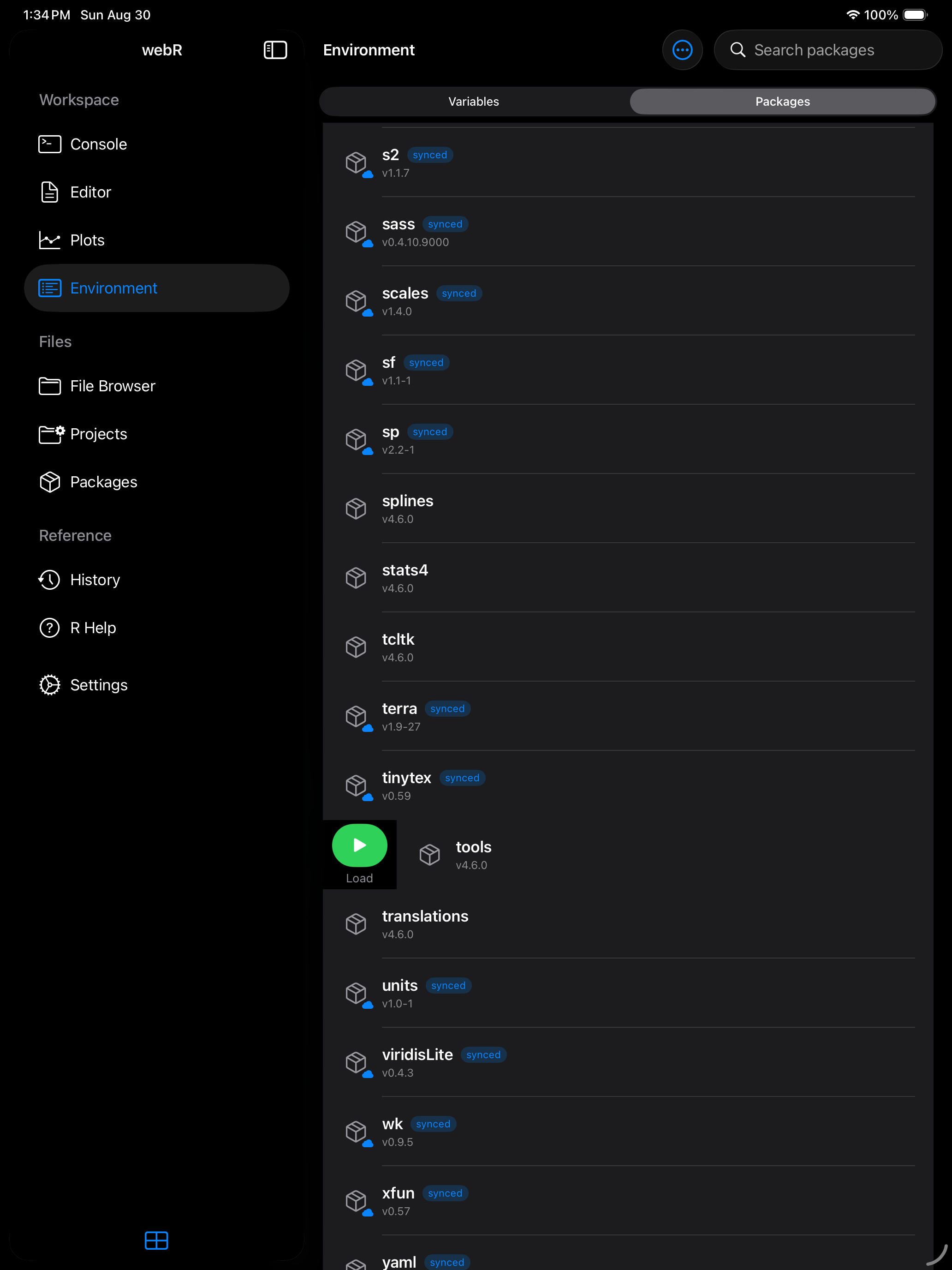 Package row swiped right revealing the green Load button on iPad in dark mode